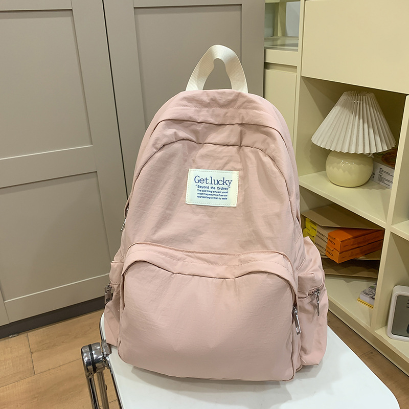 2025 nueva mochila para estudiantes universitarios japoneses, mochila escolar ligera, mochila de viaje simple, impermeable y de gran capacidad