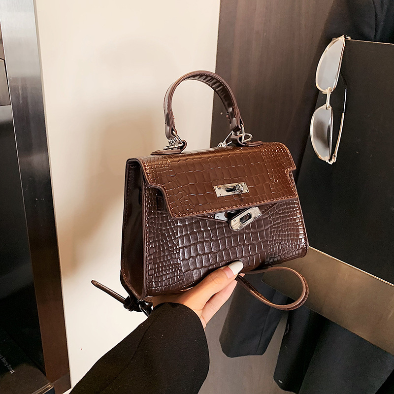 Bolsos de piedra de alta calidad para mujeres 2025, nuevos bolsos de moda portátiles de invierno versátiles mochila de viaje