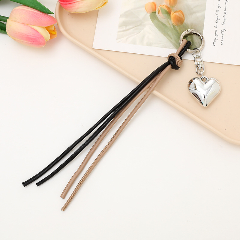 Nuevo tipo de cuerdas de cuero PU llavero colgante in bolsos de moda colgante cadena accesorios DIY tejido a mano