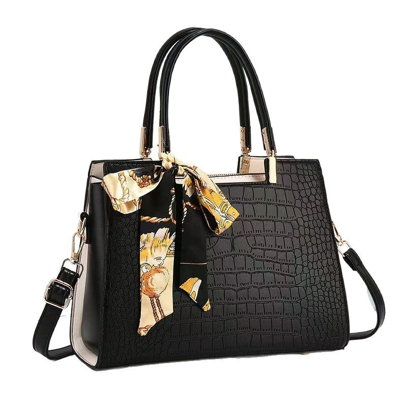 2025 nuevo fabricante de bolsas de cocodrilo de comercio exterior primavera y verano bolsas de mano de viaje de mujer versátil Emperor Rhino