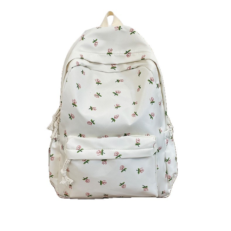 Nueva mochila de moda de flores pequeñas de estilo pastoral, mochila de estudiante de gran capacidad, mochila de viaje ligera y simple