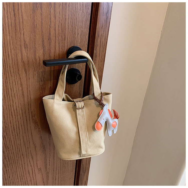 Bolso de mezclilla lindo de los niños de las mujeres 2023 Otoño Nuevo estilo coreano bolso de cubo de tela de color sólido para niños
