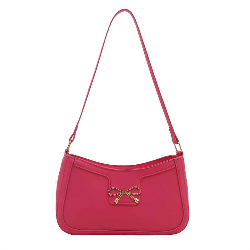 Bolso de hombro popular de este año con lazo para damas de gran capacidad 2025 color sólido nuevo bolso de axila simple de textura de moda