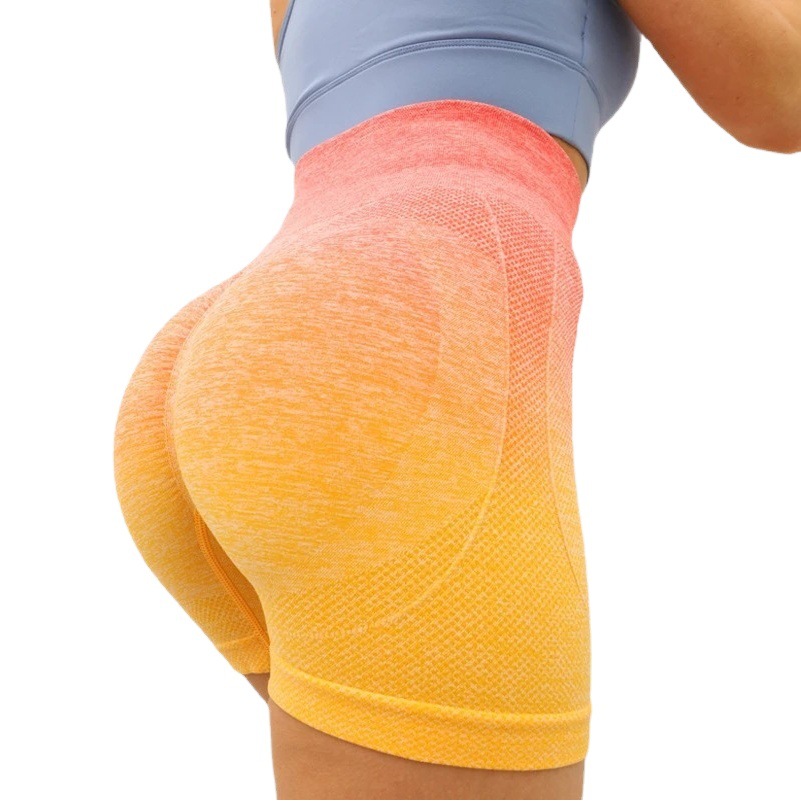 INS pantalones cortos sin costuras de gradiente europeo y americano nueva cintura alta de las mujeres transpirables a prueba de sudor Peach Hip apretado yoga fitness Pantalones
