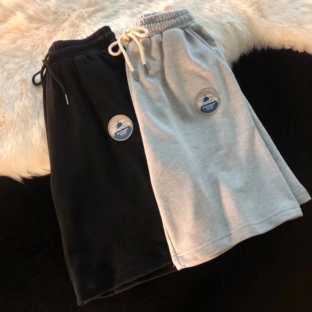 2022 retro simple color sólido deportes shorts hombres moda marca calle suelta pareja pierna ancha pantalones cortos Casuales