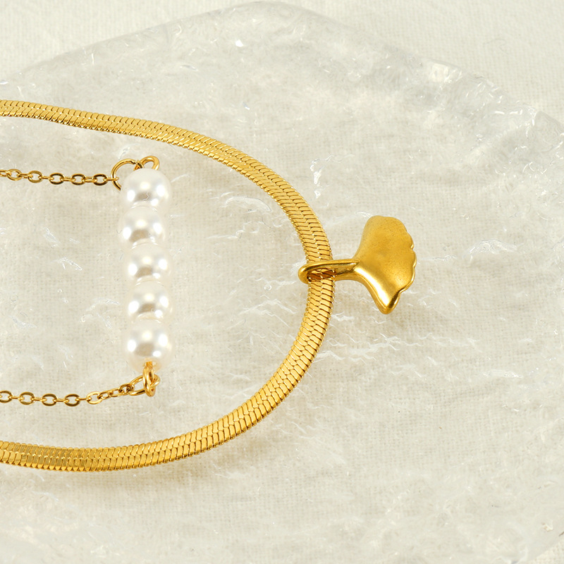 2023 nueva moda nicho collar simple doble capa apilada ginkgo hoja perla diseño sentido joyería collar al por mayor