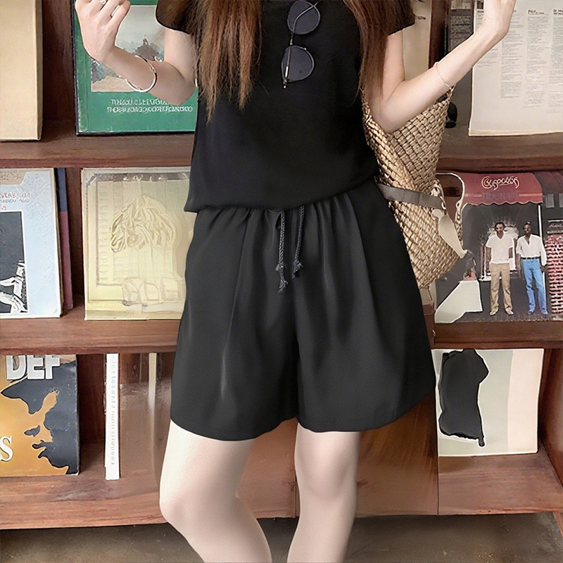 Pantalones cortos deportivos de secado rápido para mujer estilo delgado de verano 2025 nuevos pantalones de playa de pierna ancha sueltos simples y casuales