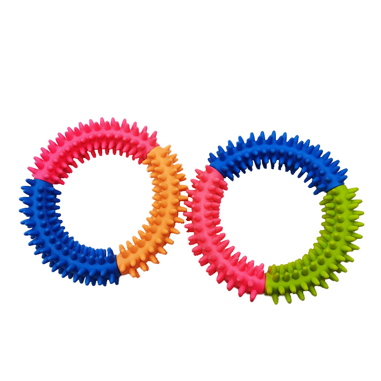 Ventas directas de fábrica nuevo TPR dientes molienda círculo color púas pegamento suave mordedura resistente perro juguete suministros para mascotas