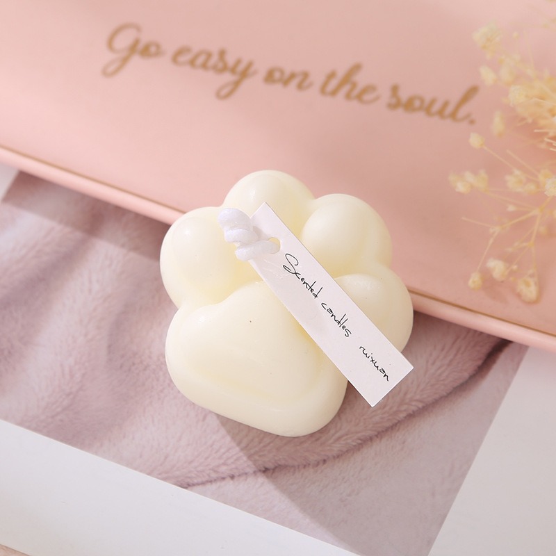 Vela artesanal de cera de soja com aroma criativo de pata de gato, um presente sofisticado e criativo. Venda por atacado._voghion.com