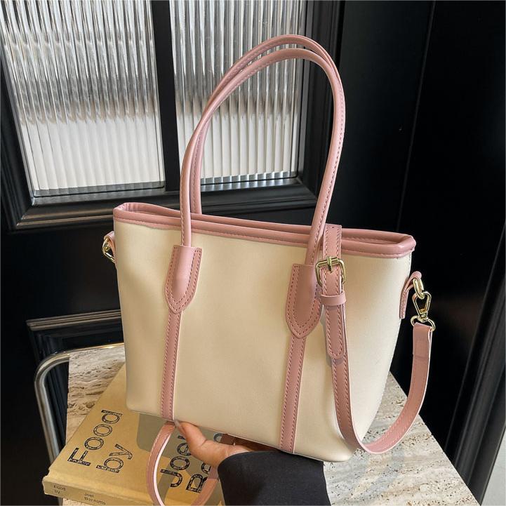 Bolso de mano de tendencia coreana para mujeres verano 2024 nuevo tipo de bolso de hombro para viajar al trabajo bolso de cubo de gran capacidad