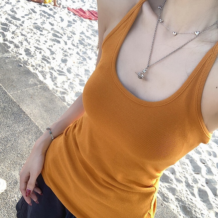 MosesQueen Queen of the Pumpkin color tank top, worn as an outer layer, with a beautiful back design, and a U-neck inner layer MosesQueen Queen of the Pumpkin color tank top, worn as an outer layer, with a beautiful back design, and a U-neck inner layer