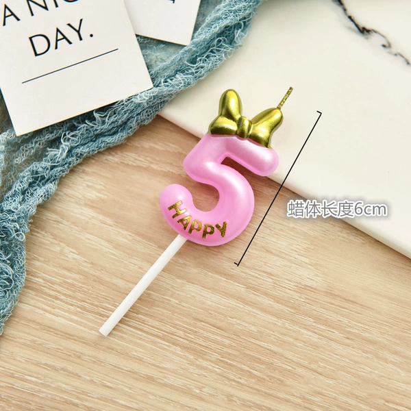 Pink fuchsia candle with bow