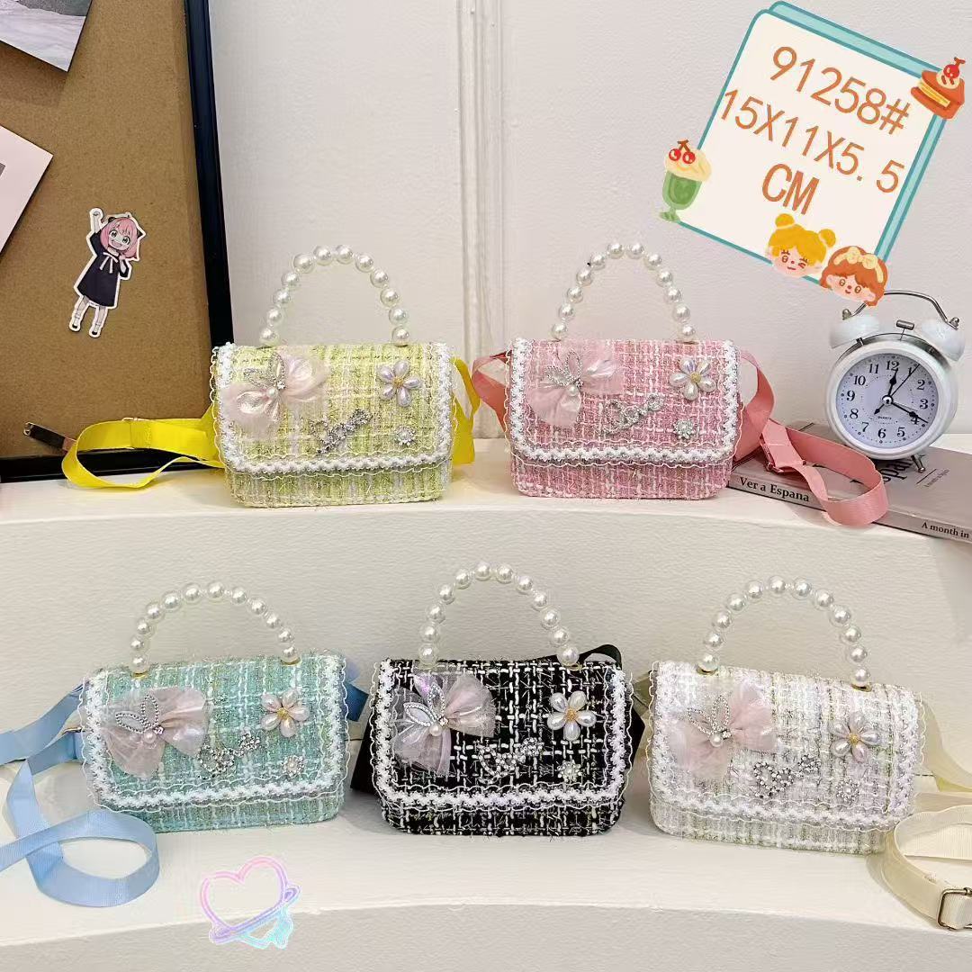 2025 nuevo estilo coreano de viento de fragancia mini niñas princesa de perlas portátil hombro único accesorios bolsos para niñas