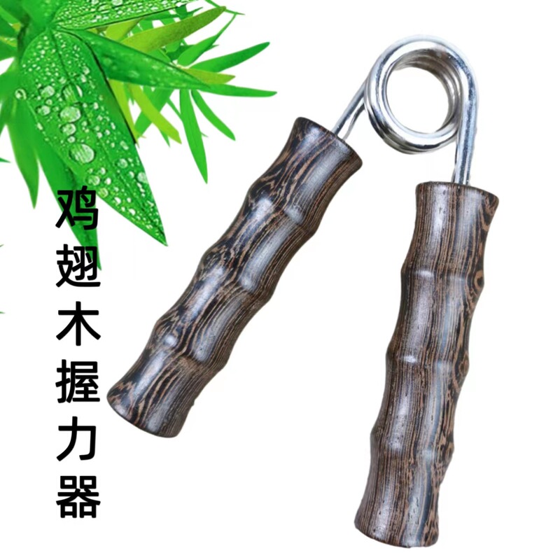 鶏の羽の木のマッサージ器のスプリングは双球をたたきます。|undefined