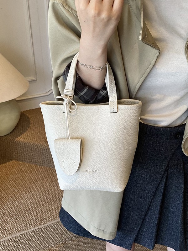 Lichi coreano bolso de cubo portátil para mujeres 2025 nuevo estilo transfronterizo simple canasta de verduras versátil bolso de hombro