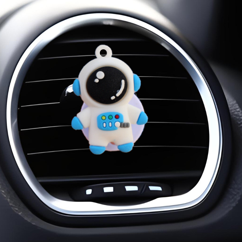 Clip de salida de aire de automóvil astronauta muñeca perfumes de automóviles dibujos animados adornos de decoración de automóviles plástico interior