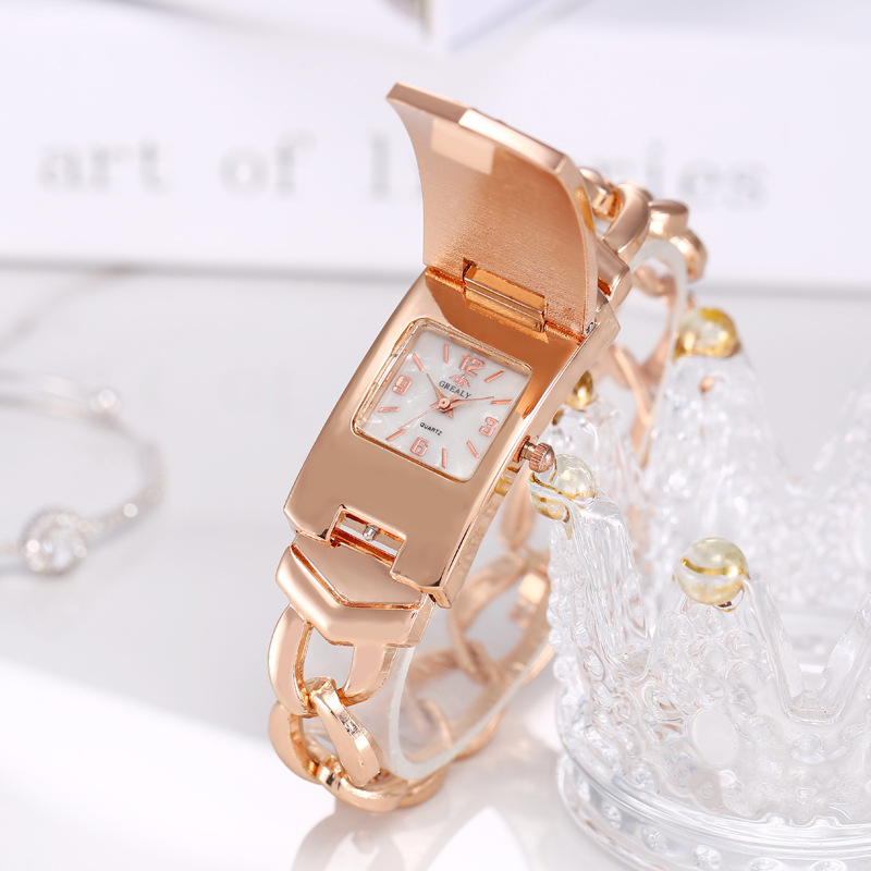 Comercio exterior nuevo estilo de diamantes de moda europea y americana Flip elegante reloj de pulsera de las mujeres reloj no mecánico reloj de cuarzo de las mujeres