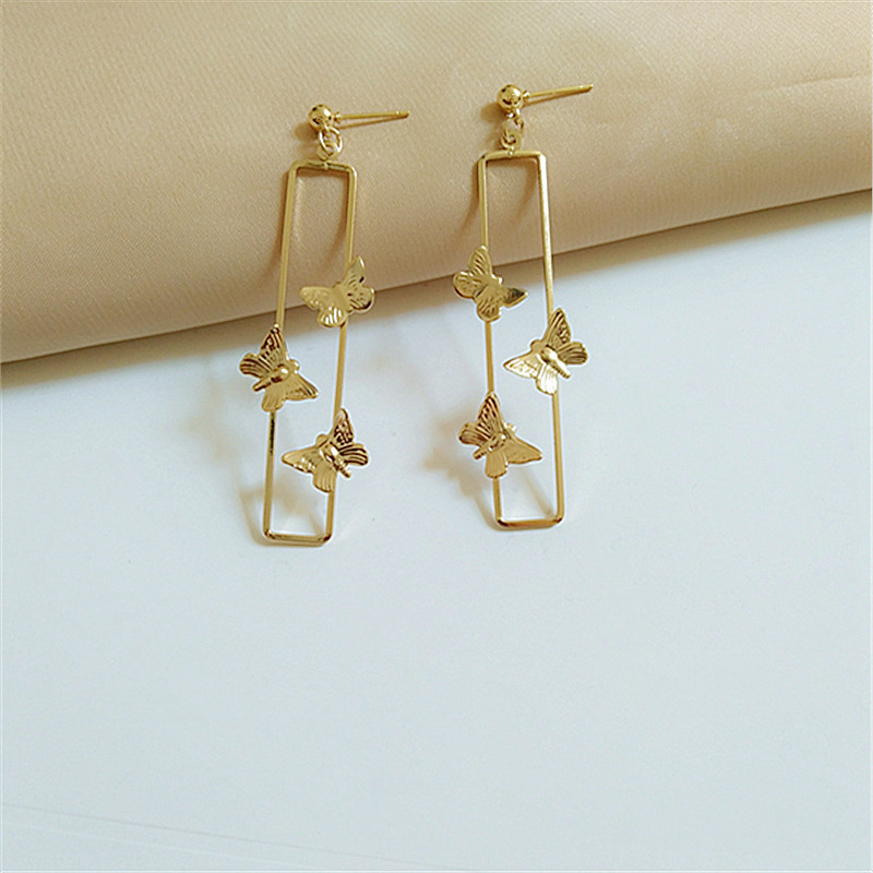 Moda Mariposa Metal Oro Con Incrustaciones Mujeres Pendientes De Gota 1 Par display picture 1