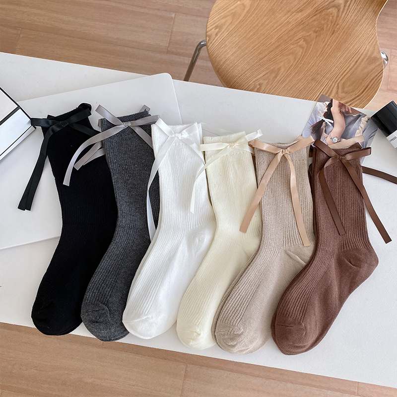 Calcetines de mujer primavera y otoño arco cinta rayas verticales dobles agujas blancas JK Lolitains calcetines de algodón Miu