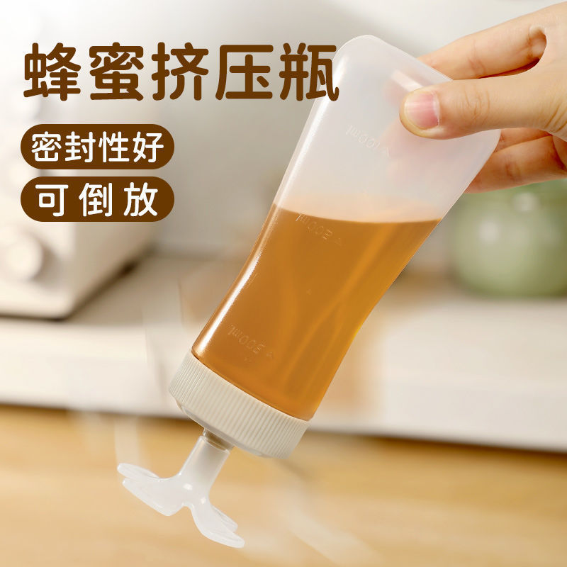 蜂蜜瓶は専用の分注瓶の食品級のケチャップのサラダソースの尖った口を逆さまにすることができます。|undefined