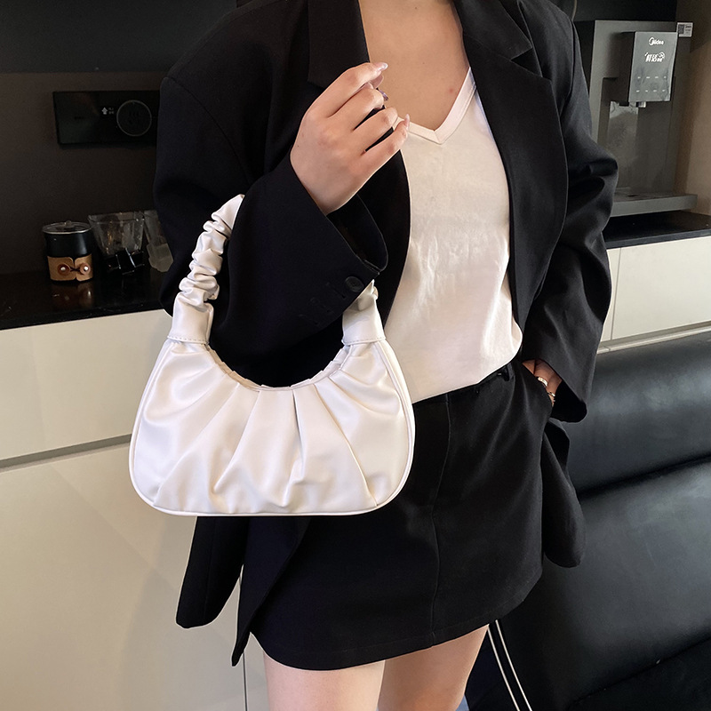 Versión coreana del bolso de axila de nicho 2025 primavera y verano nuevo bolso femenino casual bolso plisado neto del mismo estilo bolso de hombro marea