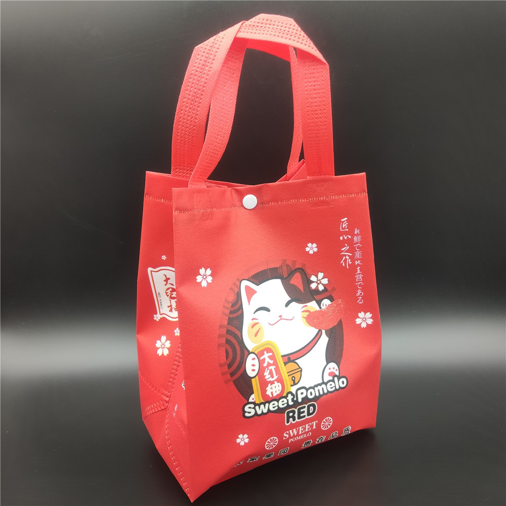 手提有扣子无纺布红心红肉柚子水果包外包装袋内包装袋塑料袋袋子