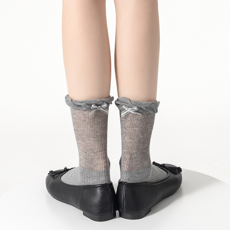 Miu serie calcetines mujer primavera y verano nuevo producto tacón lazo pila de calcetines capullo máquina todo en uno deshuesado tubo central Lolita
