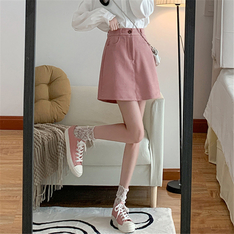 안감이나 다리가 없는 핑크색 면 스커트