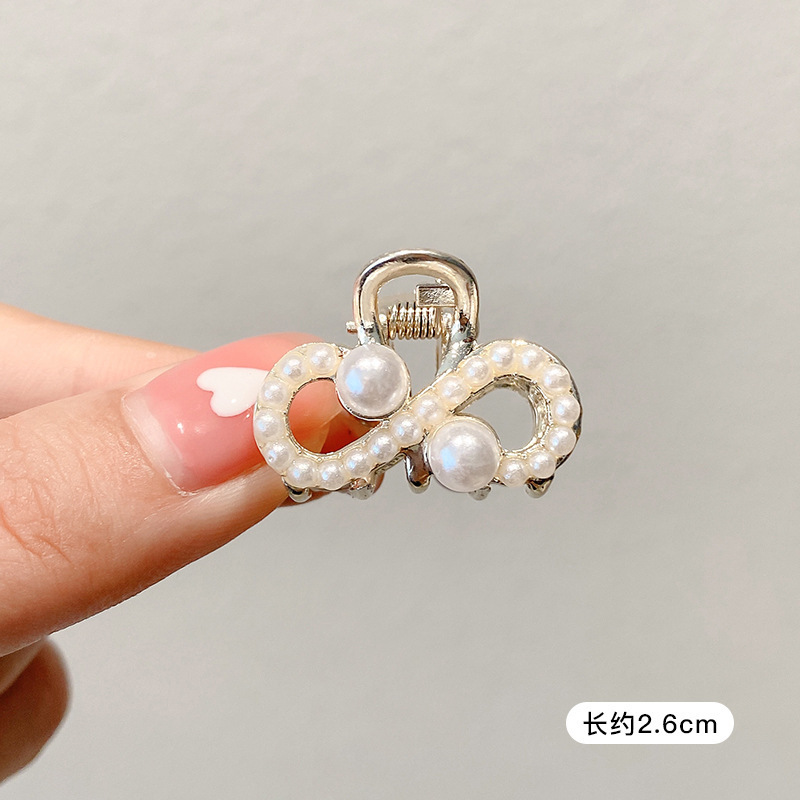 Pequeñas pinzas de cabello de perla temperamento feminino medio agarrado pinzas de cabello de borde pequeño adornamiento de cabeza de alto nivel no lastimar pinzas de cabello