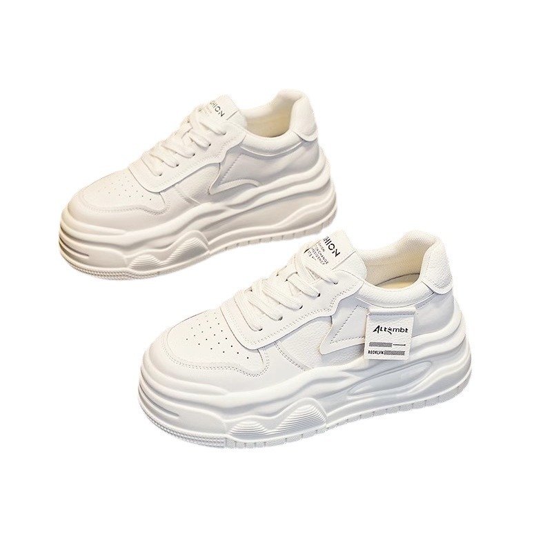 Zapatos de mujer de altura interior de cuero real 2024 primavera nueva variedad de suela gruesa pequeña muffin blanco y negro zapatos blancos zapatos de skate de mujer
