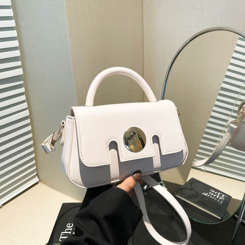 Moda coreana de este año color caramelo retro pequeño bolso femenino 2025 primavera nuevo elegante bolso bandolera ins