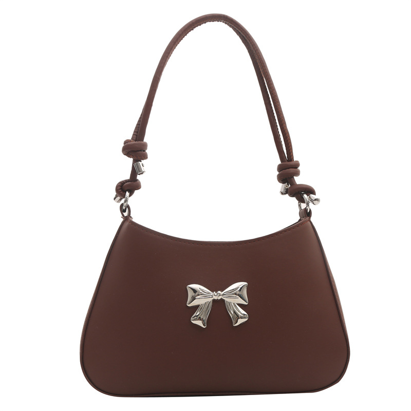 Bolso de mano de arco dulce para mujeres 2024 nueva moda coreana color caramelo brazo mochila cadena bolso de hombro