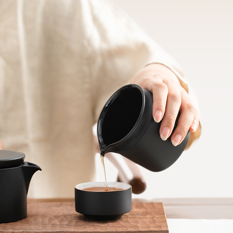 Juego de té de olla lateral Tao Runhui Un juego completo de juego de viaje simple chino Juego de té al por mayor de stock para el hogar