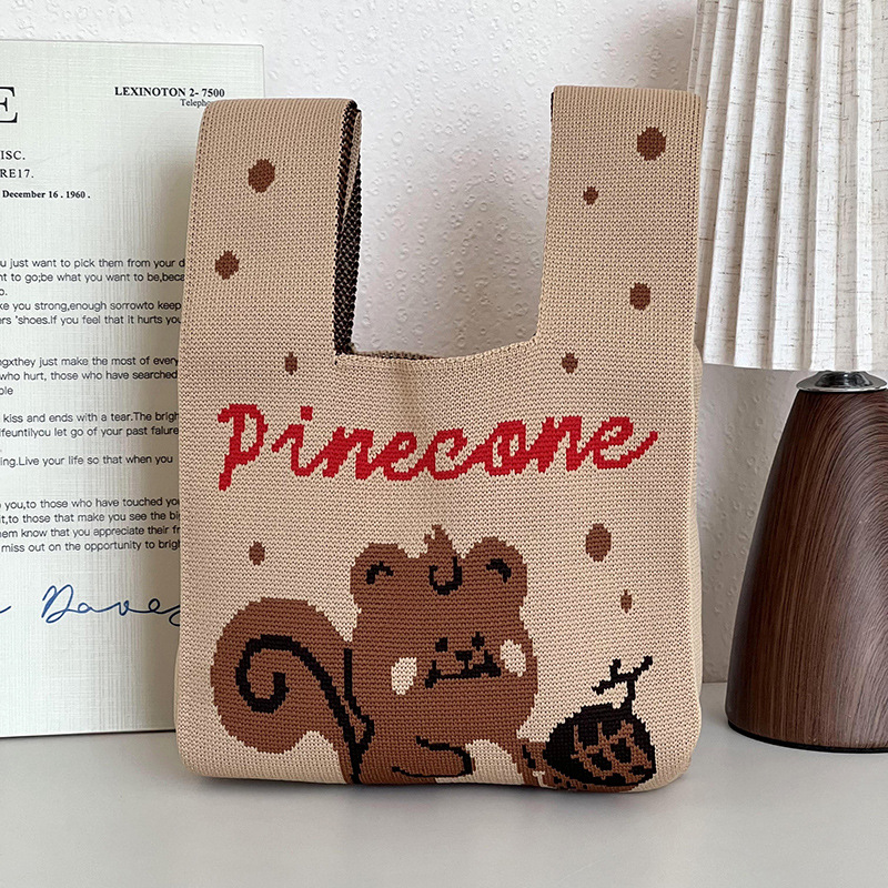 Bolsa de mano de damas nicho diseño de dibujos animados de punto chaleco de punto regalo de mano mochila de hombro al por mayor