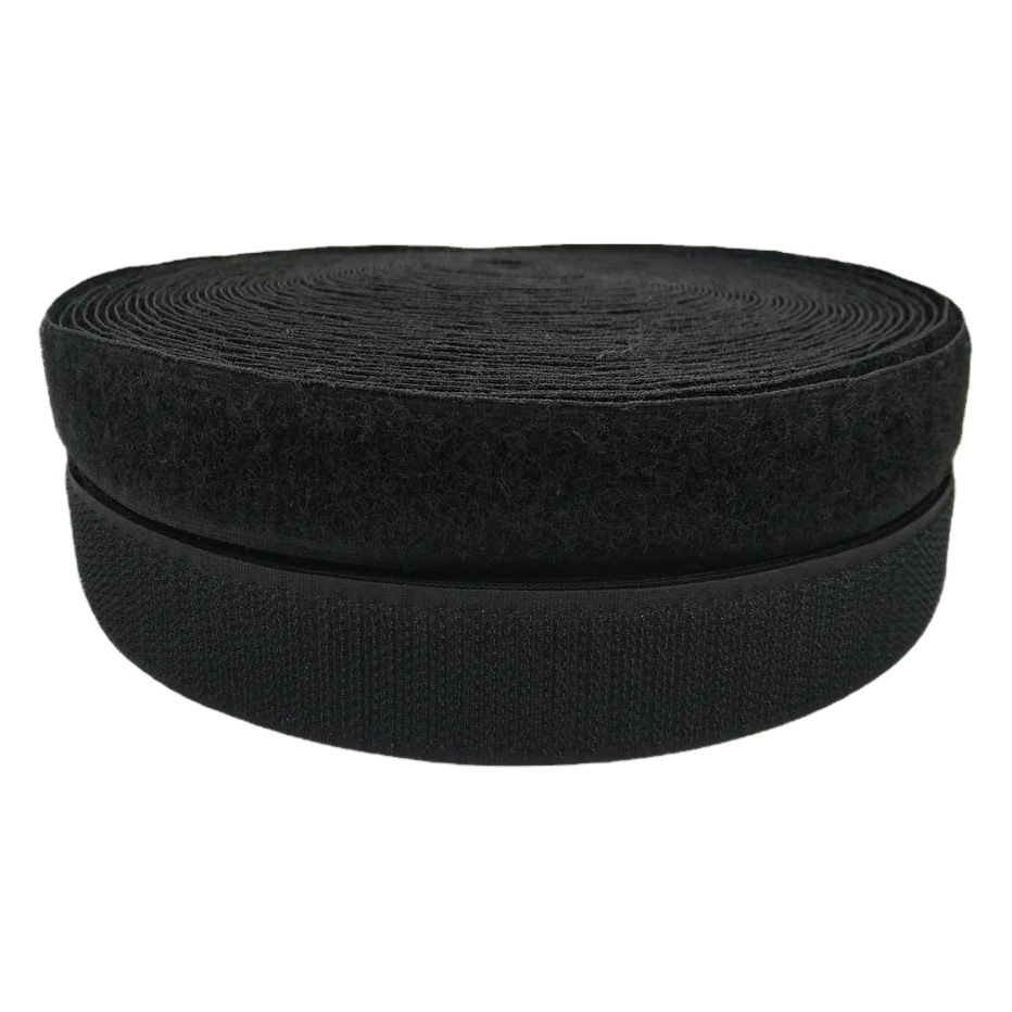 Cierres de gancho y bucle de nailon y poliéster en blanco y negro en stock para bolsos, accesorios de ropa y pantallas.