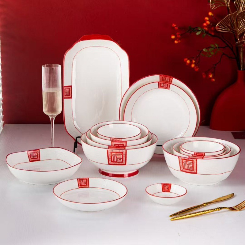 Serie de tallas de color esmalte de Año Nuevo Celebrado cubiertos de cerámica china rojos platos de platos de arroz caseros