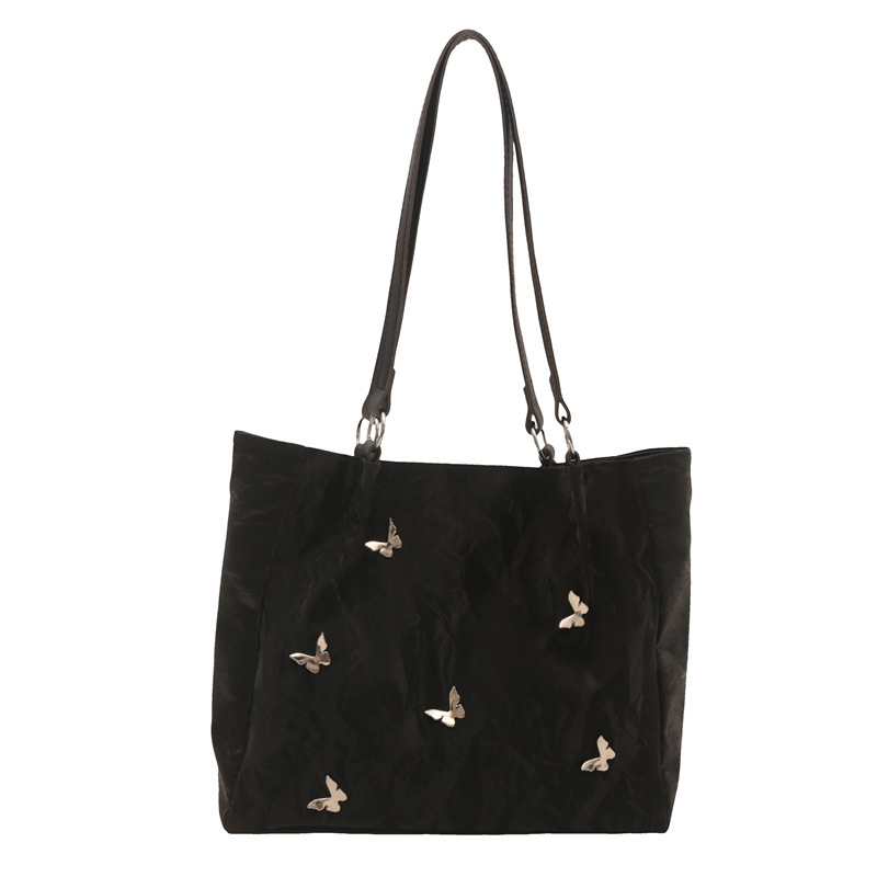 Bolsos de cubo de arco de alta calidad para mujeres 2024 verano nuevo estilo extranjero nicho bolso de hombro de moda bolso de mujer