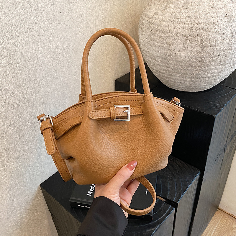 Bolso de textura transfronteriza 2025 verano nuevo estilo bolso de hombro con patrón de lichi bolso de mensajero casual de todo fósforo mujer