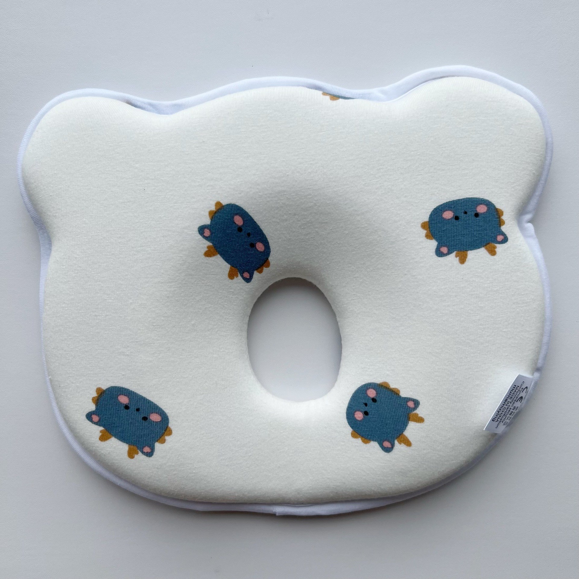 Nueva almohada de fijación de dinosaurios a juego