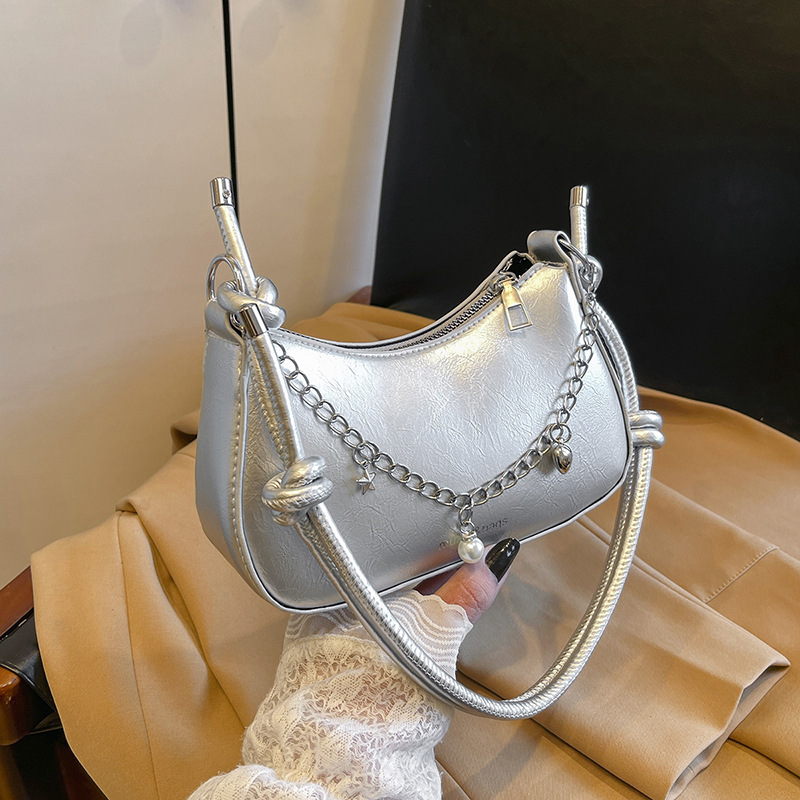 Bolsa de moda de media luna para mujeres 2024 bolso de hombro simple coreano de estilo nicho sensación de moda bolso de mujer casual