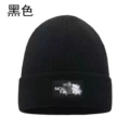 B black knitted hat