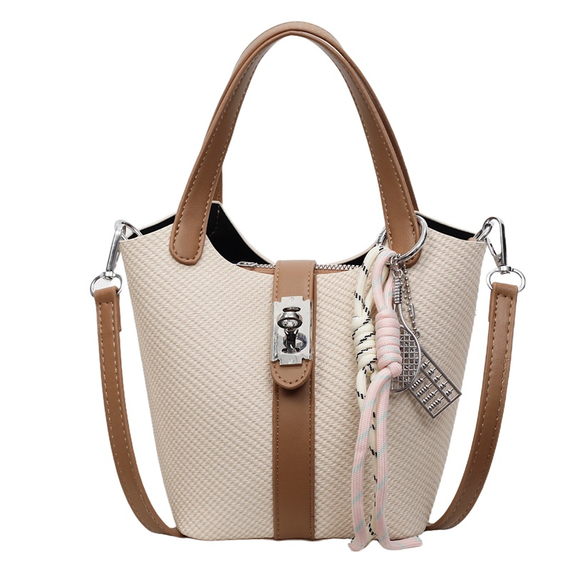 Bolso de cubo de estilo explosivo de mano de comercio exterior para mujer 2025 nuevo bolso de hombro casual de todo fósforo bolso de mensajero de estilo coreano