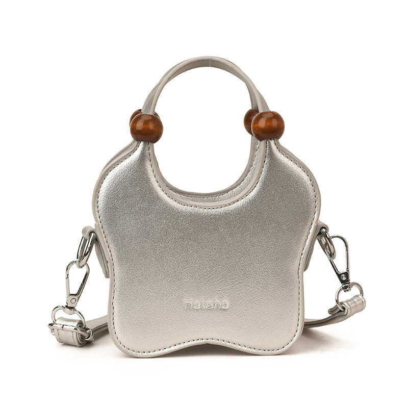 Bonita pequeña estrella en forma de bolso de hombro para niños y niñas, exquisita mini bolso de bebé, bolso para niños de comercio exterior transfronterizo