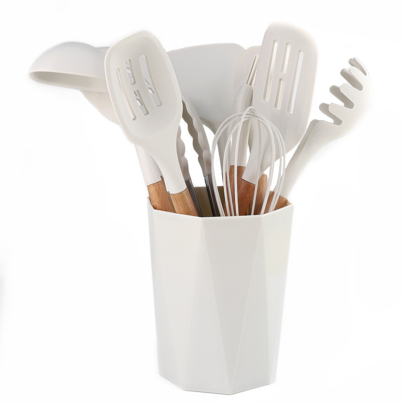 Nuevo conjunto de utensilios de cocina de silicona 11 piezas de mango de madera para el hogar, cocina de cocina frita con barril de almacenamiento