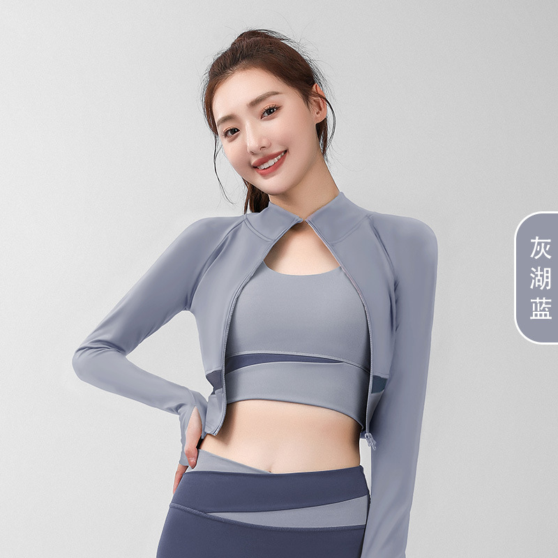 Juyitang Dew Ombligo Color Chaqueta de yoga Ropa de yoga Cuello alto Chaqueta de fitness delgada y desnuda Mujer