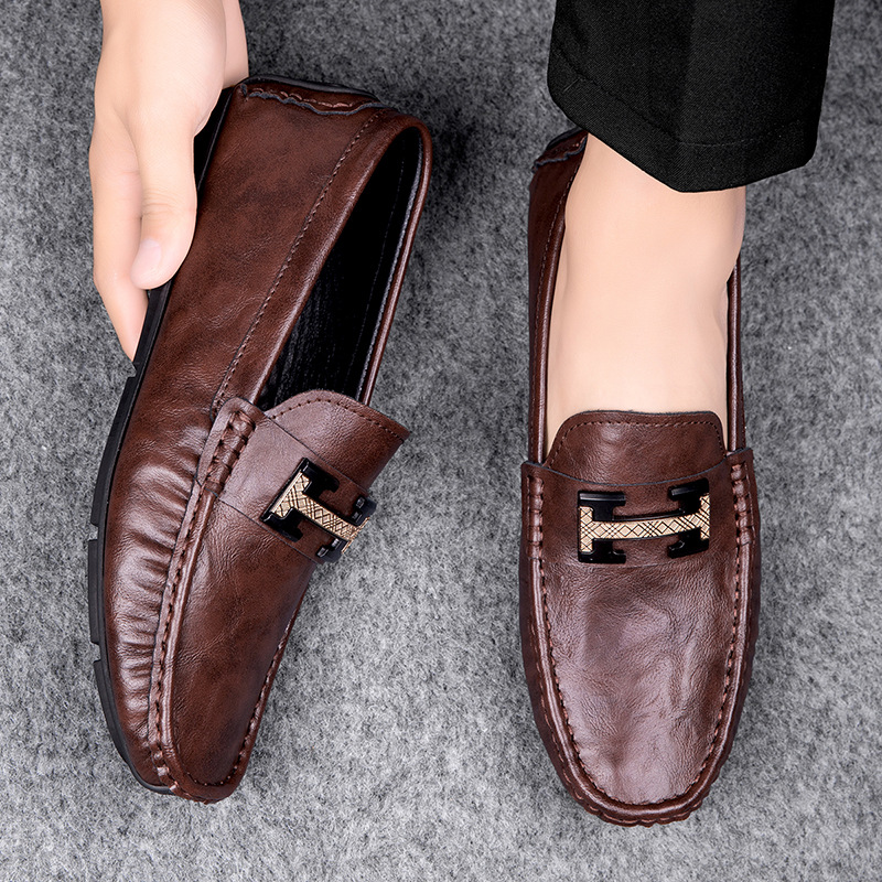 Zapatos de hombre de cuero real 2025 nuevos zapatos de negocios británicos transpirables con suela suave zapatos casuales perezosos con un pie zapatos para hombre