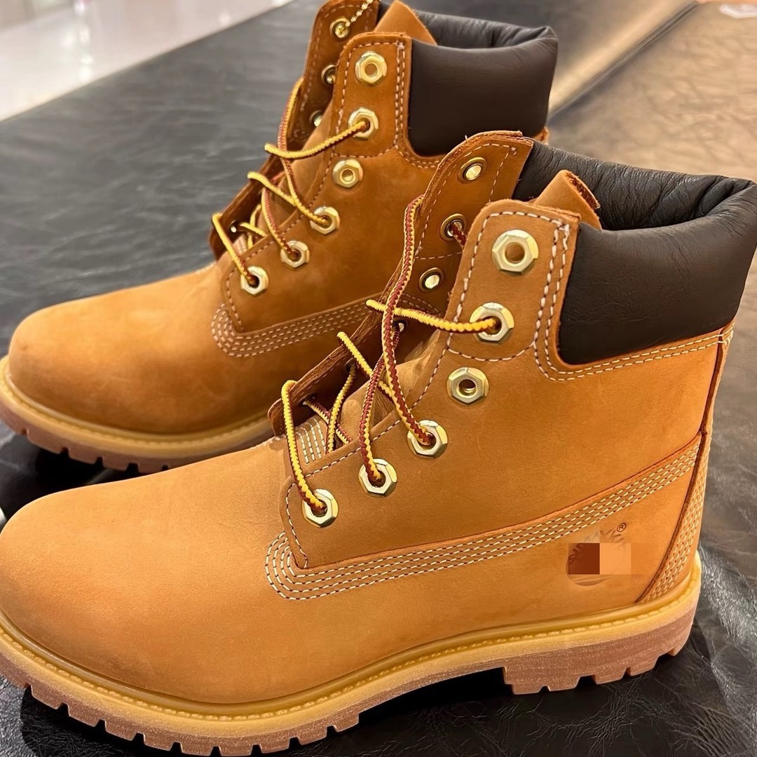 Botas de ruibarbo transfronterizas clásicas impermeables a prueba de agua y desgaste zapatos de montaña para hombres y mujeres botas de herramientas al aire libre de alto nivel botas Martin