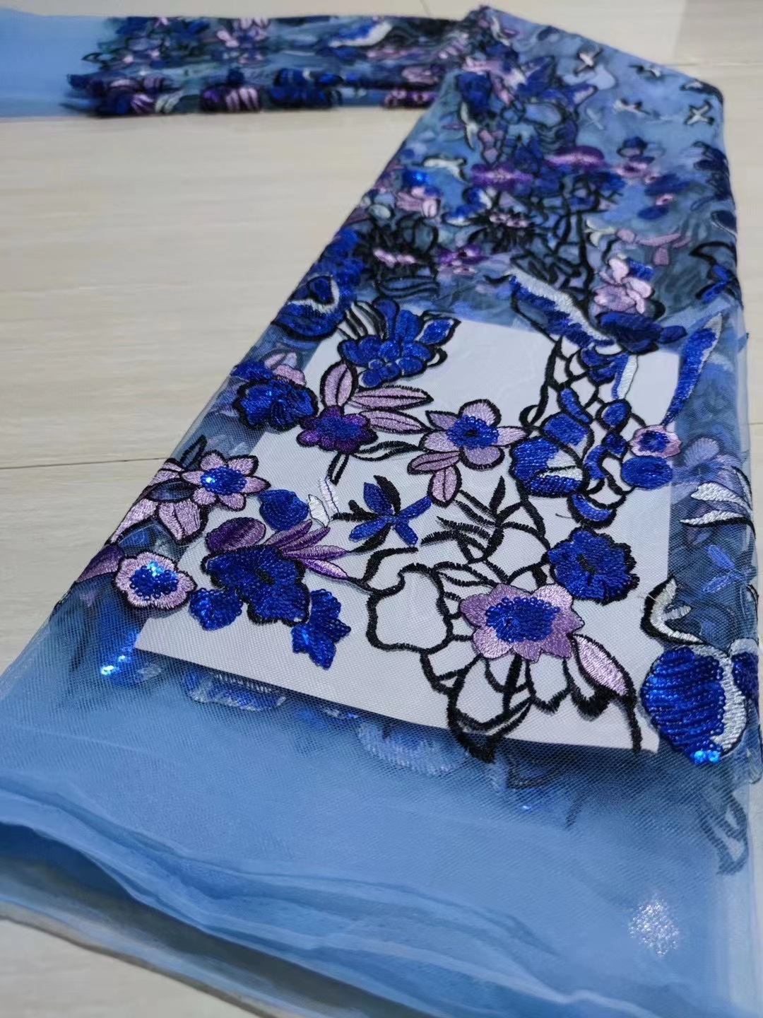 Nueva tela de encaje bordado de malla tridimensional cien flores con cuentas de ratán tela de bordado pesado JX1305