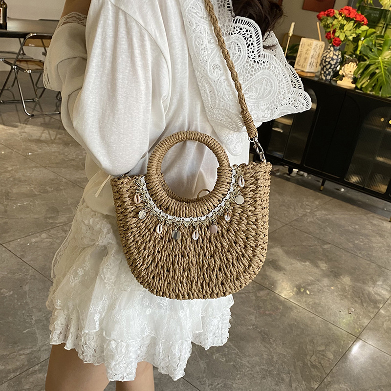 Bolso de vacaciones junto al mar 2025 verano nuevo estilo bolso de hombro de playa tejido de paja bolso de mensajero de gran capacidad mujer