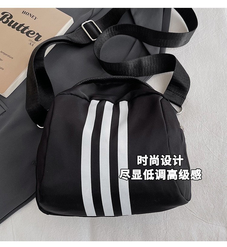 The 2024 new stylish and simple crossbody bag, a large-capacity versatile single-shoulder bag, is popular among students. The three-bar chest bag is selling well undefined